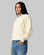 Model wearing Smart Blanks 8003 heavyweight crewneck sweatshirt in Bone, 12 oz 400 GSM blank