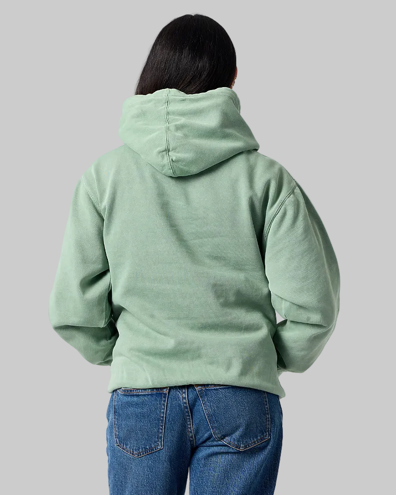 Model wearing Smart Blanks 8005 ultra heavyweight fashion hoodie in Vintage Sage, back view, 12 oz 400 GSM blank