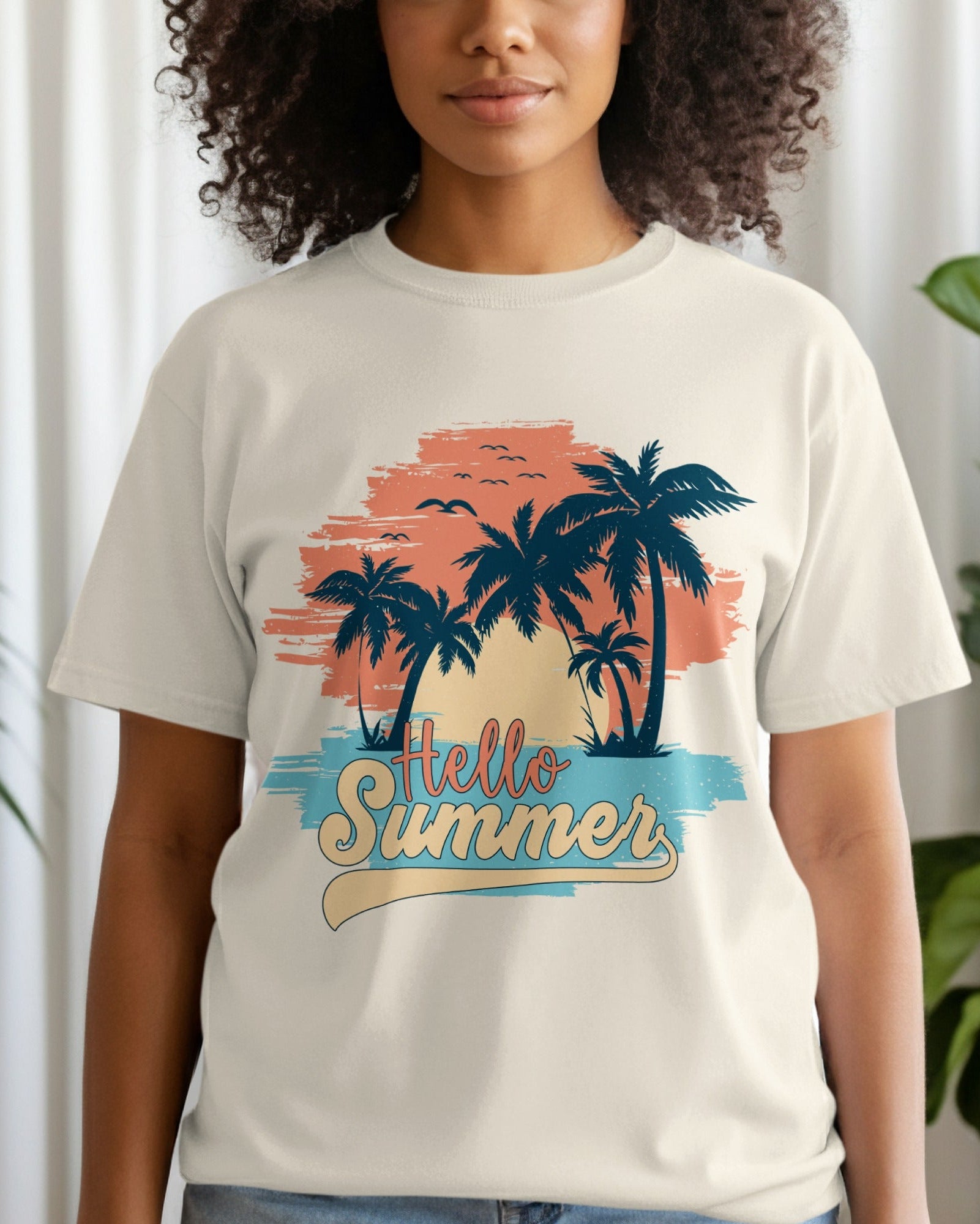 Person wearing a 'Hello Summer' t-shirt with palm tree design indoors.