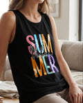 Person wearing a black tank top with colorful text sitting on a couch.