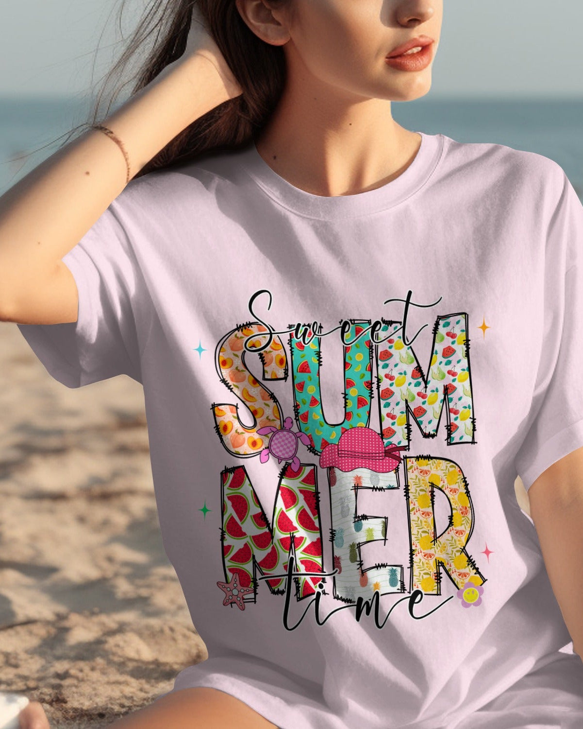 Woman wearing a 'Summer Time' t-shirt on a beach